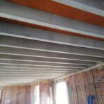 Biga-formigó-llisa-color-natural-i-encaellat-vermell